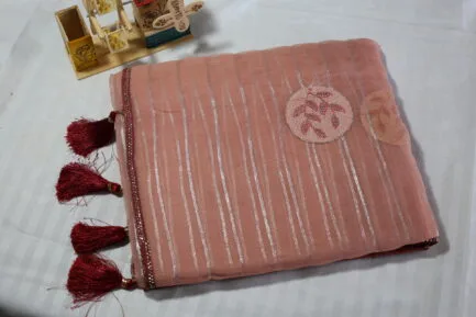 Organza Zari Saree in dark peach in light shade color in beautiful wrap